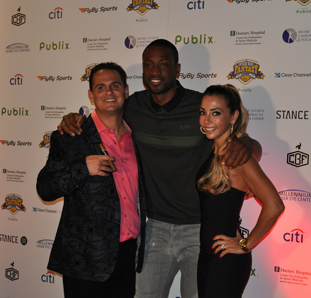 From L. to R. - Jason Wood, Dwyane Wade, Tatiana Miranda-Wood